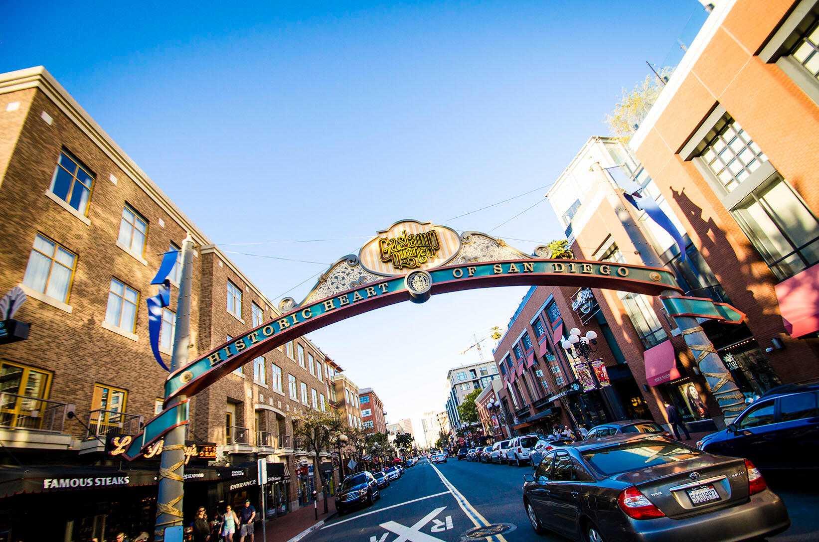 Historic Gaslamp Quarter archway in downtown San Diego on a bright day, capturing civic identity and public life.